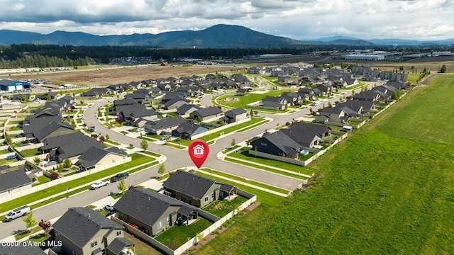 13311 N Loveland Way, Hayden, ID 83835 - aerial view of residential area with a mountain backdrop