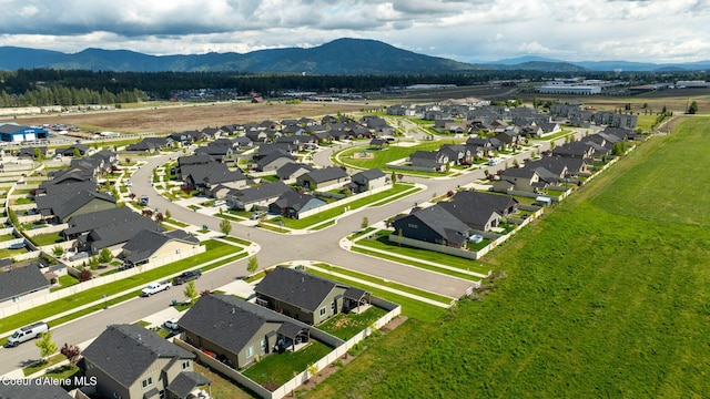13311 N Loveland Way, Hayden, ID 83835 - aerial view of residential area with a mountain backdrop