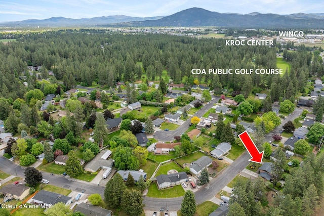 2840 W Masters Dr, Coeur Dalene, ID 83815 - view of property location featuring mountains, a forest, and nearby suburban area