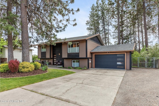 2840 W Masters Dr, Coeur Dalene, ID 83815 - view of front facade featuring concrete driveway, an attached garage, and roof with shingles