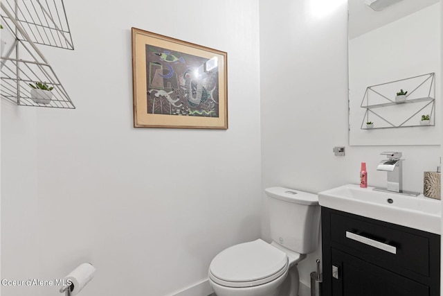 2840 W Masters Dr, Coeur Dalene, ID 83815 - bathroom with vanity, toilet, and baseboards