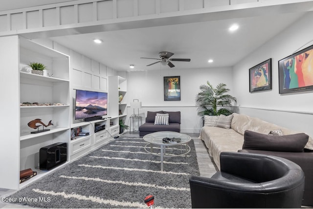 2840 W Masters Dr, Coeur Dalene, ID 83815 - living room with a ceiling fan, recessed lighting, wood finished floors, built in features, and baseboards
