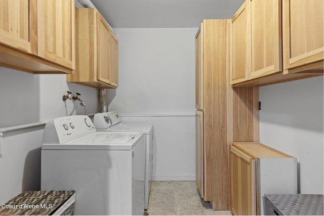 2840 W Masters Dr, Coeur Dalene, ID 83815 - laundry room featuring independent washer and dryer and cabinet space