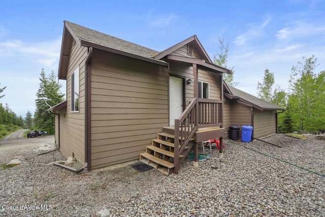 558 Grouse Hill Rd, Bonners Ferry, ID 83805 - back of property with a shingled roof