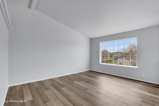 2230 N Methow Ct, Post Falls, ID 83854 - unfurnished room featuring wood finished floors and baseboards