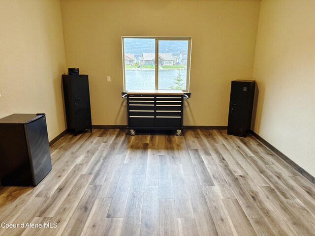 14441 N Pristine Cir, Rathdrum, ID 83858 - spare room featuring wood finished floors and baseboards