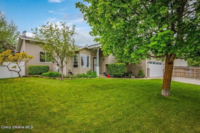 9147 N Entiate Dr, Hayden, ID 83835 - view of front facade featuring concrete driveway and an attached garage