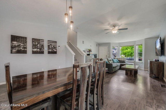 9147 N Entiate Dr, Hayden, ID 83835 - dining area with a ceiling fan, wood finished floors, stairs, and baseboards