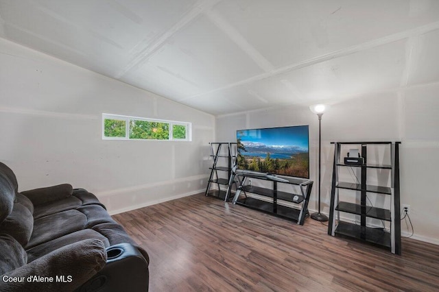9147 N Entiate Dr, Hayden, ID 83835 - living area with vaulted ceiling, wood finished floors, and baseboards