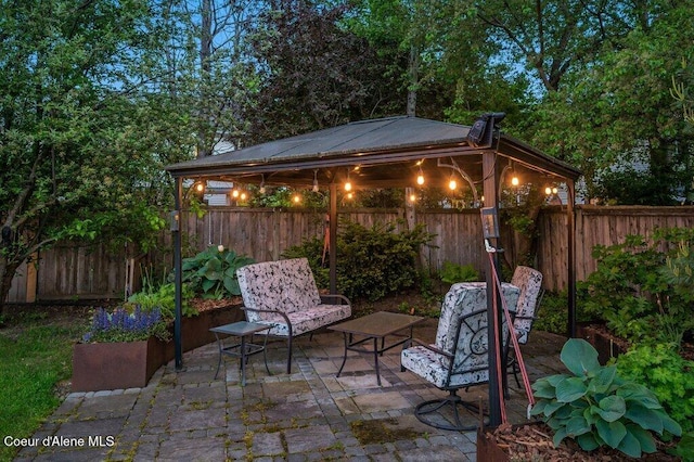 9147 N Entiate Dr, Hayden, ID 83835 - fenced backyard with a patio and a gazebo