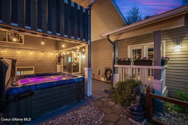 9147 N Entiate Dr, Hayden, ID 83835 - view of patio with a hot tub