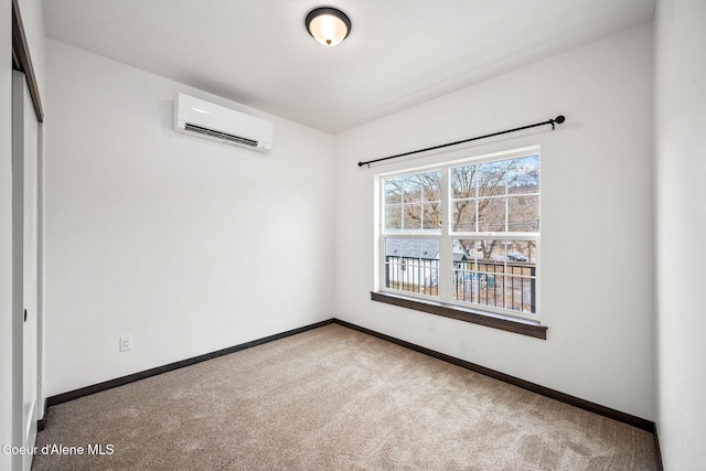 2248 N Syringa St, Post Falls, ID 83854 - carpeted empty room with an AC wall unit and baseboards