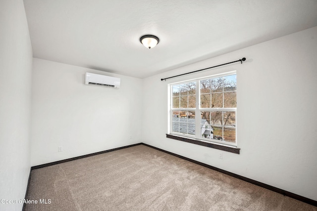 2248 N Syringa St, Post Falls, ID 83854 - empty room with a wall mounted air conditioner, carpet, and baseboards