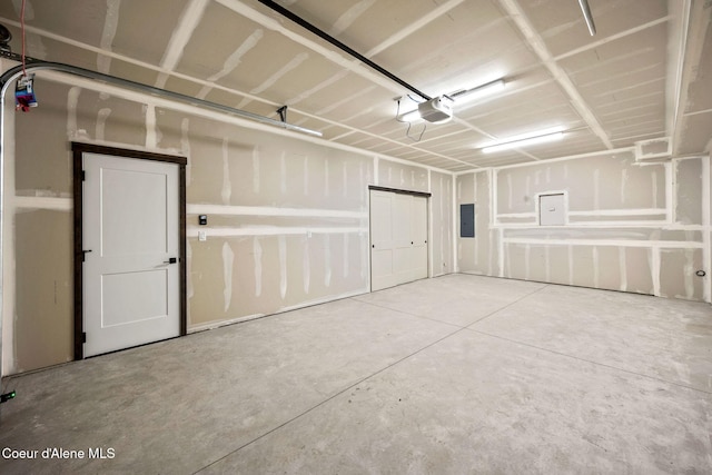 2248 N Syringa St, Post Falls, ID 83854 - garage with a garage door opener and electric panel