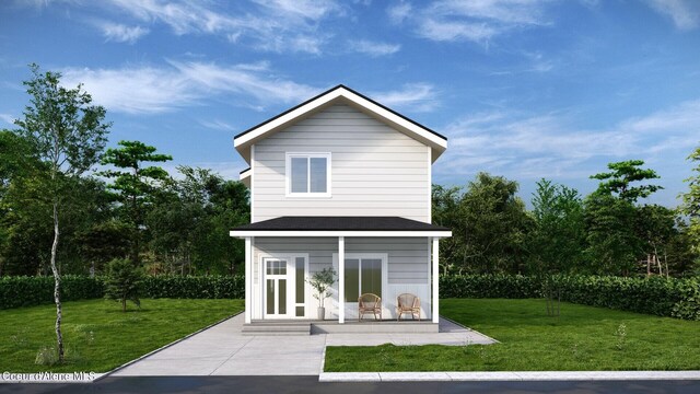 2248 N Syringa St, Post Falls, ID 83854 - back of house with a lawn