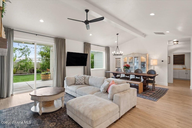 2917 N Bygone Way, Post Falls, ID 83854 - living room with light wood-style flooring, healthy amount of natural light, a chandelier, ceiling fan, and recessed lighting