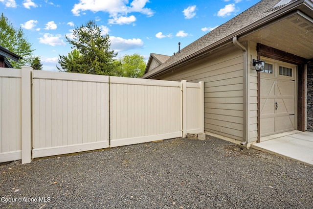 1044 E Maroon Creek Dr, Hayden, ID 83835 - view of property exterior featuring roof with shingles