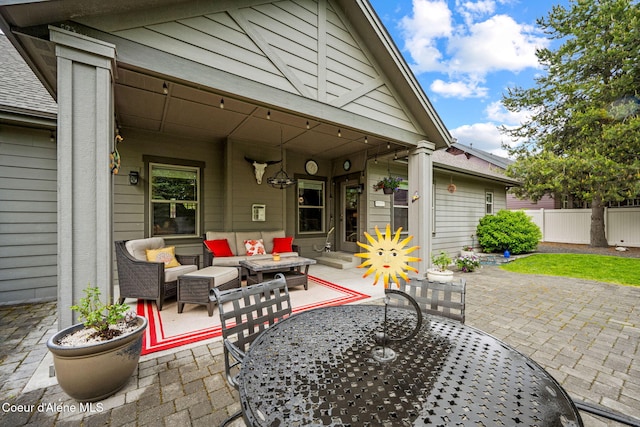 1044 E Maroon Creek Dr, Hayden, ID 83835 - view of patio / terrace with an outdoor living space and outdoor dining space