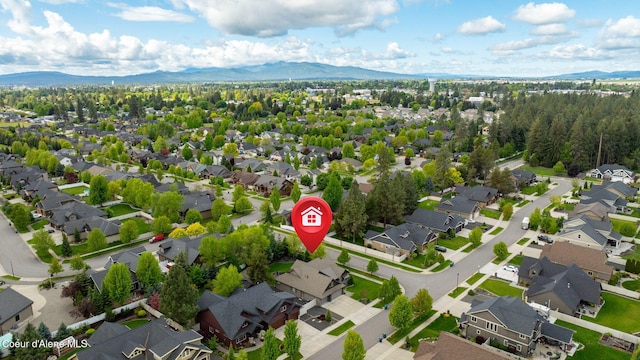 1044 E Maroon Creek Dr, Hayden, ID 83835 - aerial view of residential area featuring mountains