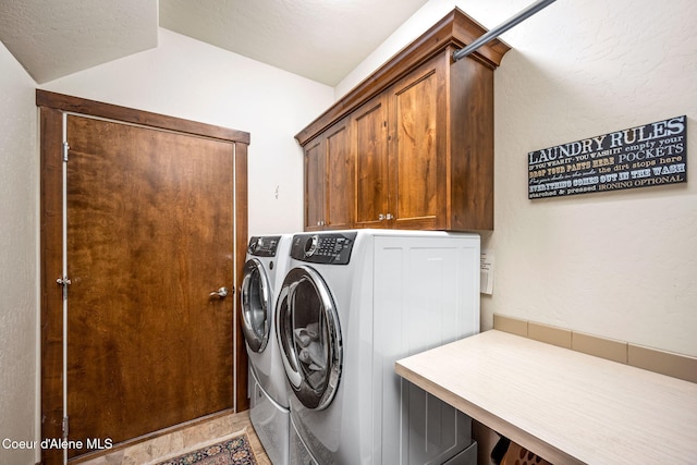 1044 E Maroon Creek Dr, Hayden, ID 83835 - laundry area featuring cabinet space and washing machine and dryer