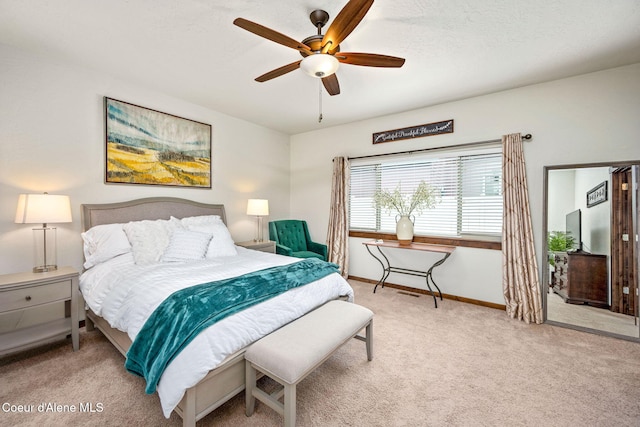 1044 E Maroon Creek Dr, Hayden, ID 83835 - bedroom featuring carpet flooring, baseboards, and a ceiling fan