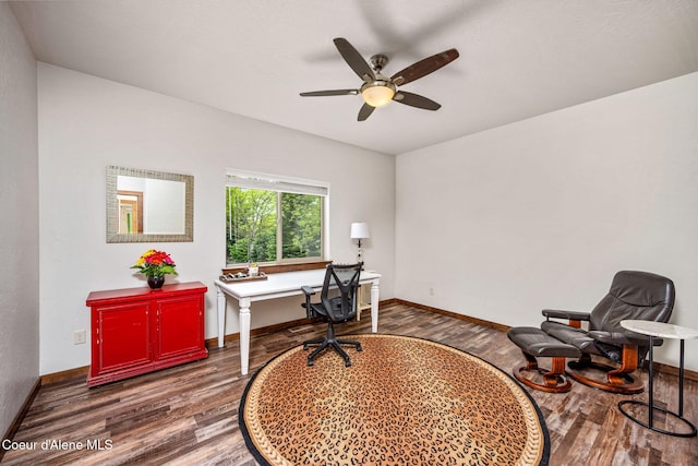 1044 E Maroon Creek Dr, Hayden, ID 83835 - home office with wood finished floors, a ceiling fan, and baseboards