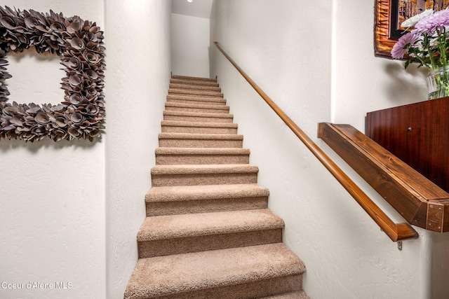 1044 E Maroon Creek Dr, Hayden, ID 83835 - stairs with a textured wall