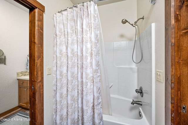 1044 E Maroon Creek Dr, Hayden, ID 83835 - full bathroom with shower / bathtub combination with curtain and vanity
