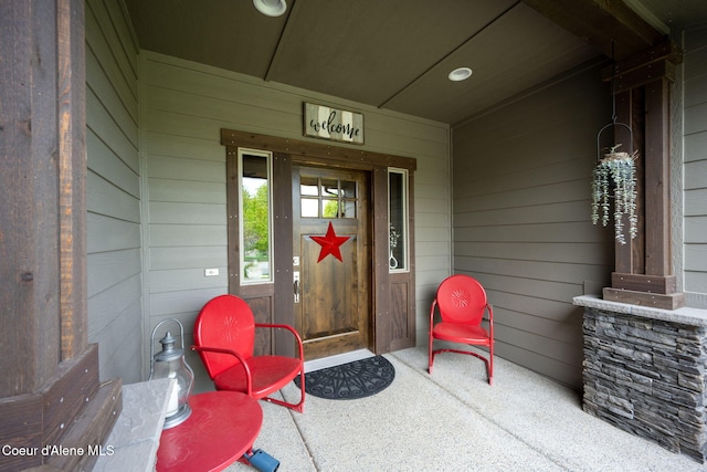 1044 E Maroon Creek Dr, Hayden, ID 83835 - entrance to property featuring a porch
