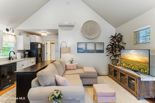 199 Pomrankey Ln, Dover, ID 83825 - living area featuring high vaulted ceiling and baseboards