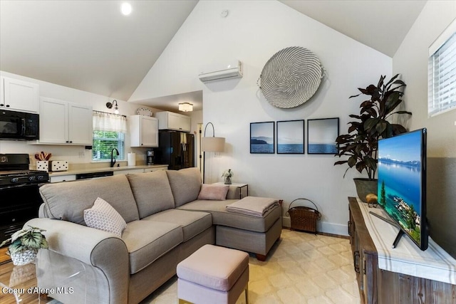 199 Pomrankey Ln, Dover, ID 83825 - living area with light flooring, high vaulted ceiling, healthy amount of natural light, and baseboards