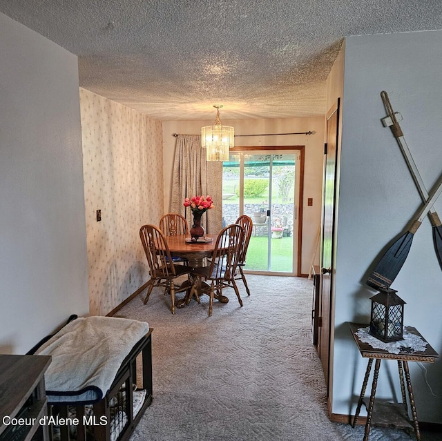 8705 N Ramsey Rd, Hayden, ID 83835 - carpeted dining room with a chandelier, a textured ceiling, and baseboards