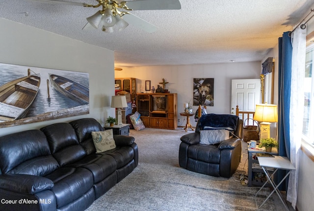 8705 N Ramsey Rd, Hayden, ID 83835 - living area with carpet, a textured ceiling, and ceiling fan