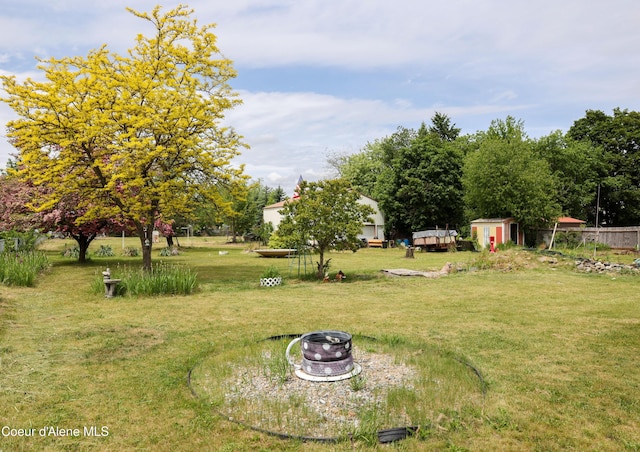 8705 N Ramsey Rd, Hayden, ID 83835 - view of yard with a fire pit