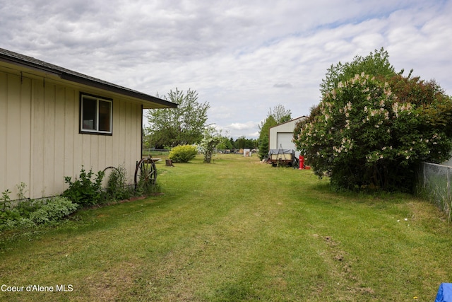 8705 N Ramsey Rd, Hayden, ID 83835 - view of yard featuring a detached garage