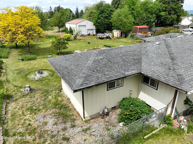 8705 N Ramsey Rd, Hayden, ID 83835 - view of property exterior with roof with shingles and a detached garage