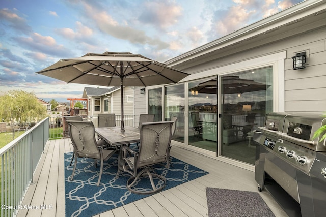14441 N Pristine Cir, Rathdrum, ID 83858 - wooden deck with outdoor dining space and area for grilling