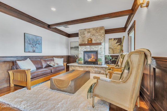 4618 S Scenic Dr, Coeur Dalene, ID 83814 - living room featuring beamed ceiling, ornamental molding, wood finished floors, a fireplace, and recessed lighting