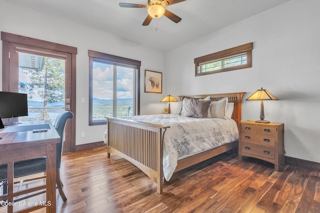 4618 S Scenic Dr, Coeur Dalene, ID 83814 - bedroom featuring access to outside, multiple windows, wood finished floors, and an office area