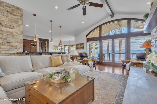 4618 S Scenic Dr, Coeur Dalene, ID 83814 - living area with beamed ceiling, a ceiling fan, recessed lighting, high vaulted ceiling, and wood finished floors