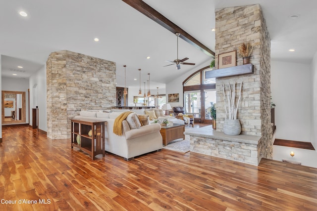 4618 S Scenic Dr, Coeur Dalene, ID 83814 - living room featuring a ceiling fan, wood finished floors, beamed ceiling, high vaulted ceiling, and recessed lighting