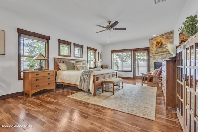 4618 S Scenic Dr, Coeur Dalene, ID 83814 - bedroom featuring hardwood / wood-style flooring, multiple windows, baseboards, and recessed lighting