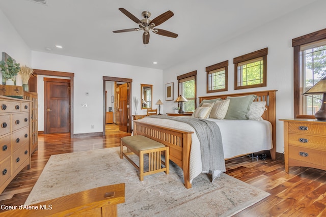 4618 S Scenic Dr, Coeur Dalene, ID 83814 - bedroom with wood finished floors, recessed lighting, baseboards, and ceiling fan