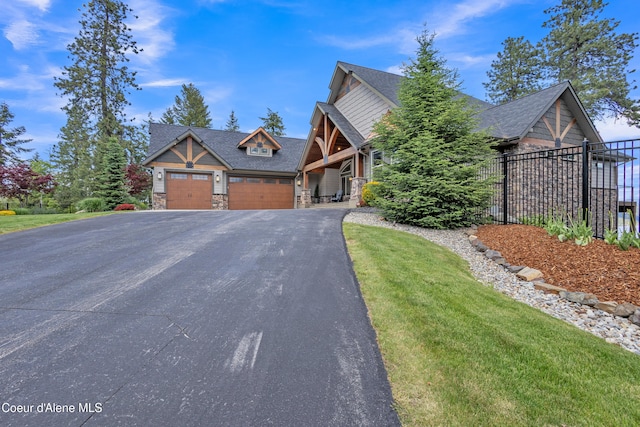4618 S Scenic Dr, Coeur Dalene, ID 83814 - craftsman inspired home with stone siding, asphalt driveway, an attached garage, and roof with shingles