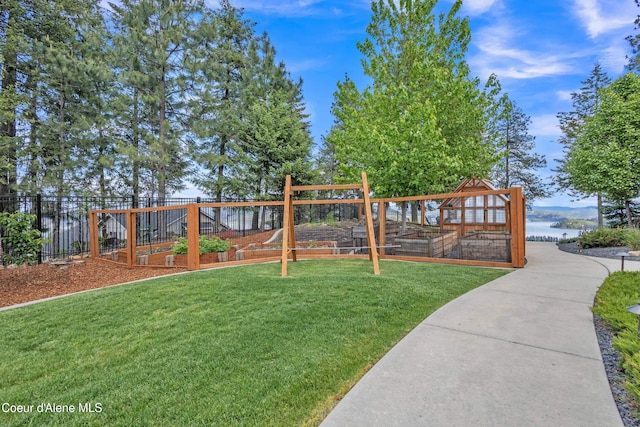4618 S Scenic Dr, Coeur Dalene, ID 83814 - view of home's community featuring a vegetable garden and a water view