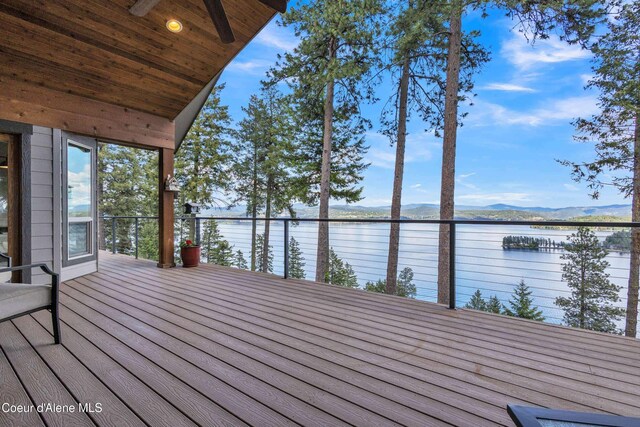 4618 S Scenic Dr, Coeur Dalene, ID 83814 - wooden deck featuring a water and mountain view