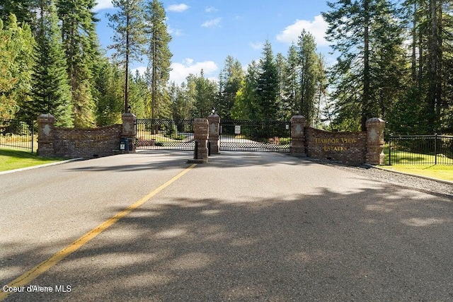 4618 S Scenic Dr, Coeur Dalene, ID 83814 - view of asphalt road with a gate