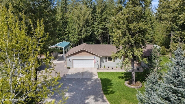 23815 N Rapalla Ct, Athol, ID 83801 - view of front of property featuring a front lawn, driveway, and an attached garage
