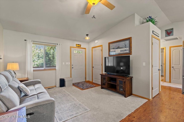 23815 N Rapalla Ct, Athol, ID 83801 - living area with vaulted ceiling, baseboards, a ceiling fan, and wood finished floors