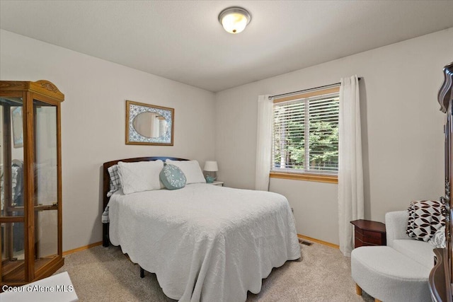 23815 N Rapalla Ct, Athol, ID 83801 - bedroom with light colored carpet and baseboards